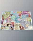 A patchwork wall hanging 142 cm x 92 cm