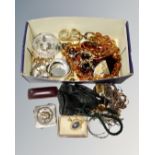 A box of assorted costume jewellery, leather purse,