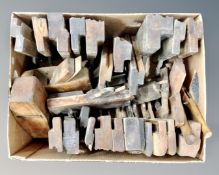 A box containing a large quantity of woodworking planes including mould,