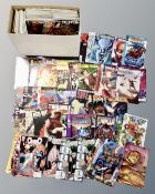 A box containing approximately 200 late 20th to early 21st century comics including Team 7,