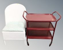 A 20th century metal three tier serving trolley, together with a painted wicker bedroom chair.
