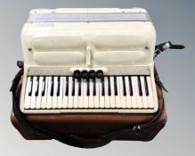 A Soprani Ampliphonic Coletta piano accordion in case.