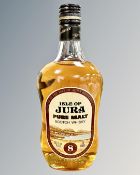 A bottle of Isle of Jura Pure Malt Scotch Whisky, 8 years old, 75.