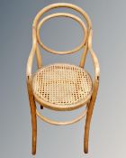 An Edwardian bentwood bergere seated child's high chair.