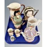 A tray containing an oversized Jolly Good Health Toby jug,