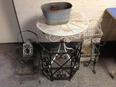 A wrought metal occasional table, three planters,