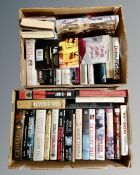Two boxes containing hardback books, novels, autobiographies.