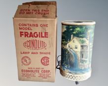 A mid-century Econolite corporation motion lamp with original box.