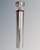 A stainless steel LED driveway bollard.