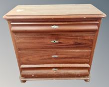 A 19th century Scandinavian stained pine four drawer chest.