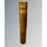 A brass trench art shell stick stand, height 57cm.