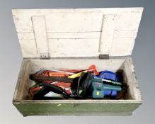A vintage pine crate containing Black & Decker hedge trimmer with lead,