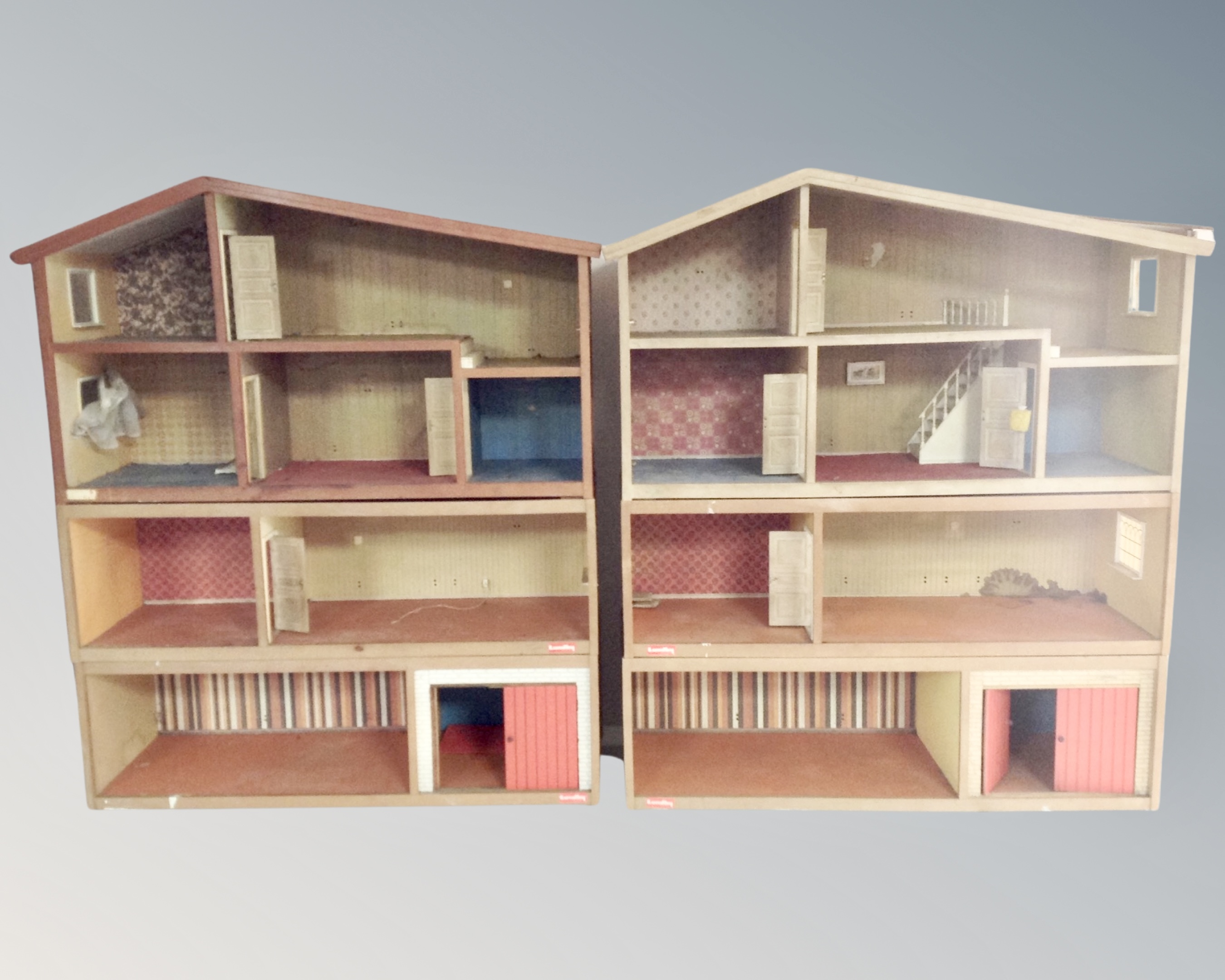 Two mid-century Swedish Lundby doll's houses together with a box containing a quantity of furniture