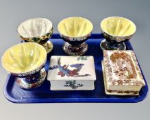 A tray containing four Maling lustre sundae dishes together with two Maling lustre lidded trinket