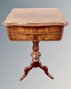 A 19th century continental mahogany two drawer pedestal sewing table.