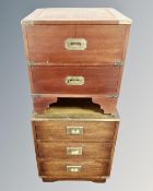 Two campaign style chests with brass drop handles.