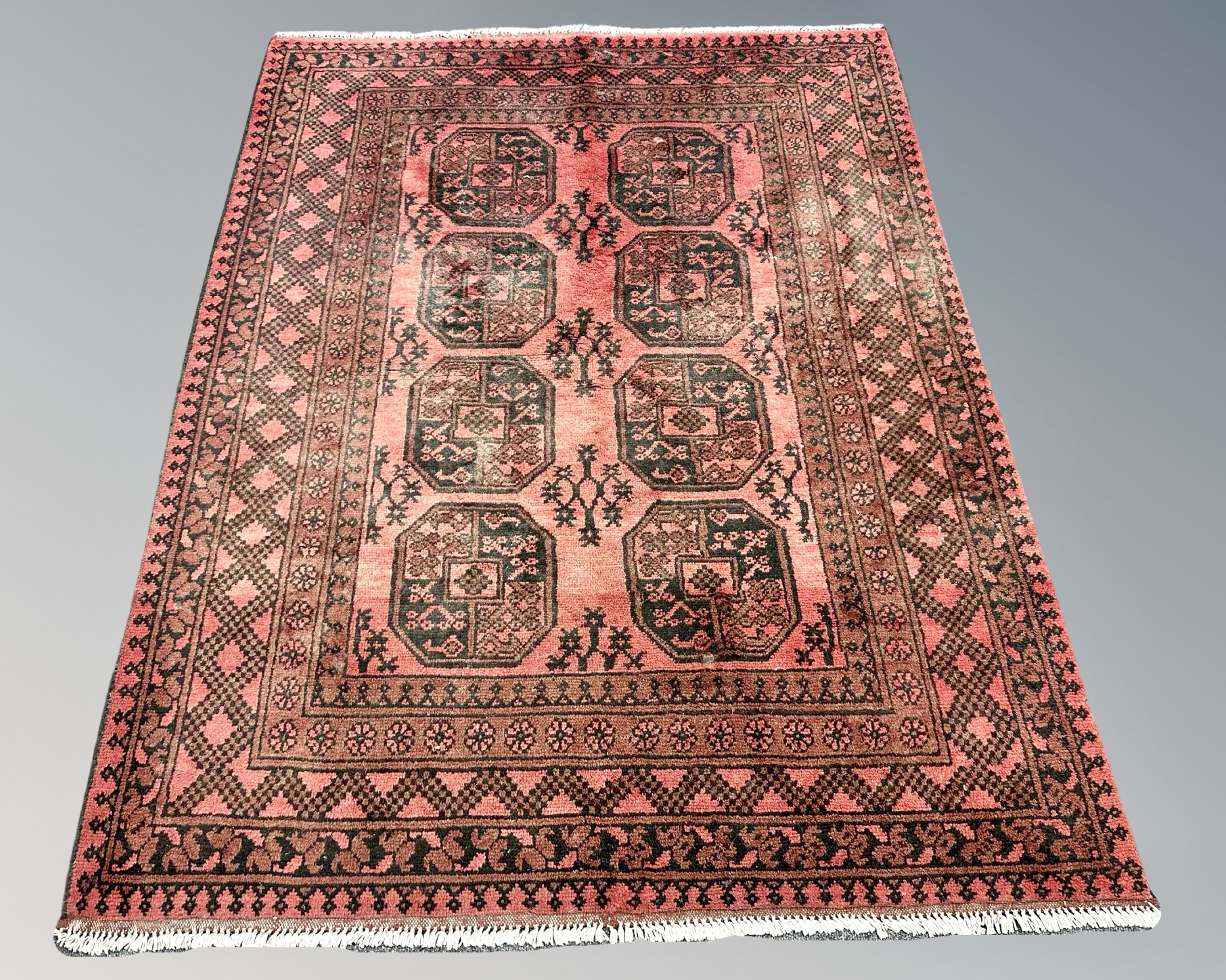 A Bokhara rug, Afghanistan, 155cm by 203cm.