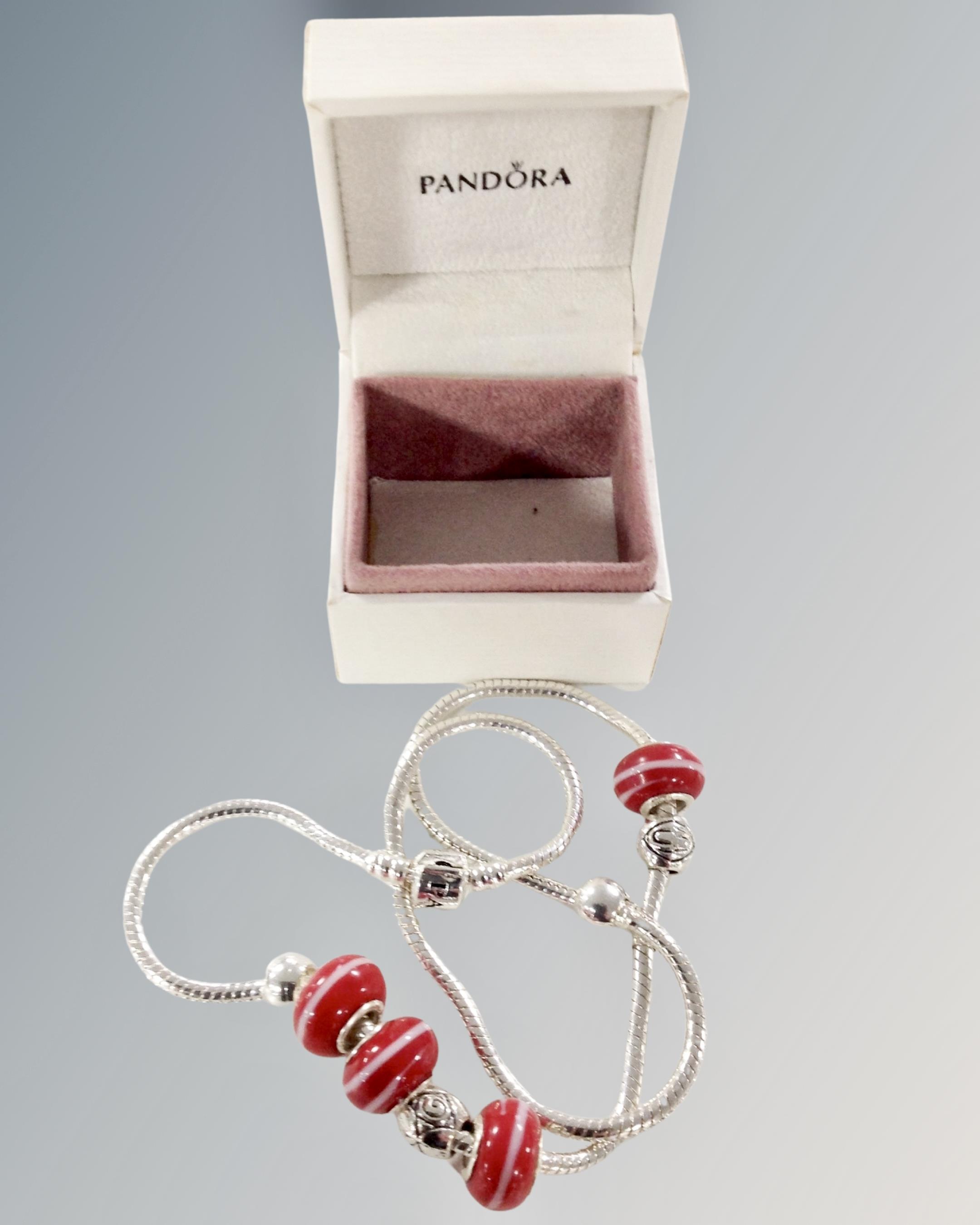 A Pandora silver necklace in box.