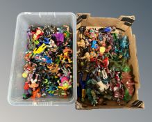Two boxes containing a quantity of 1980s and later action figures including He-Man, turtles,