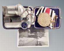 A Special Constabulary medal together with two whistles, badge, monochrome photograph.