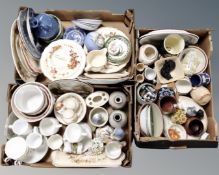 Three boxes containing assorted ceramics including Royal Doulton dinnerware, figurines,