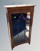 A 19th century inlaid mahogany glazed door display cabinet