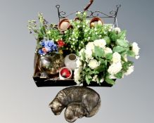 A box containing a two tier stand containing miniature plant pots with artificial flowers,
