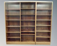 A Scandinavian rosewood two section open bookcase.