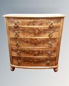 A 19th century Scandinavian walnut bow front five drawer chest.