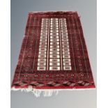 A Tekke rug, Afghanistan, 124cm by 198cm.