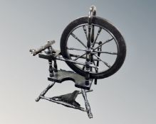 A 19th century ebonised Danish spinning wheel.