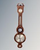 A rosewood veneered banjo barometer.