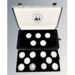 A World Wildlife fund 25th Anniversary coin collection, 25 silver proof coins, cased.