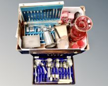 A box containing vintage glass rolling pin, glass vases, plated wares, canteens of cutlery.
