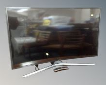 A Samsung Smart Curve TV model UE40JU6740U, with remote.