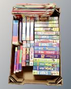 A box containing five Harry Potter paperback volumes, vintage Viz comics,