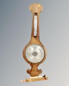 A 19th century banjo barometer with silvered dial with key, retailed by G.