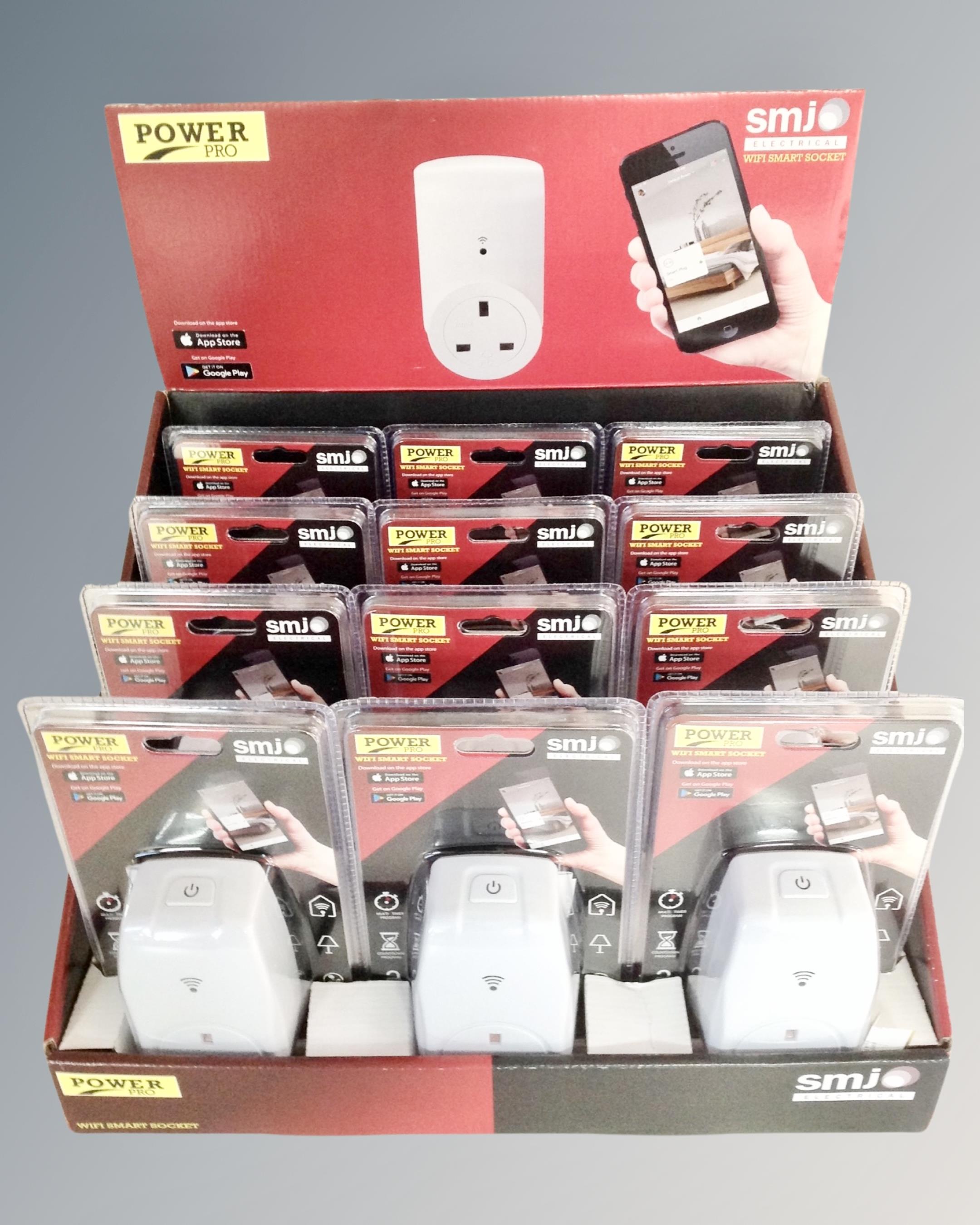 12 Powerpro wifi smart sockets, sealed and new, in cardboard shop display stand.