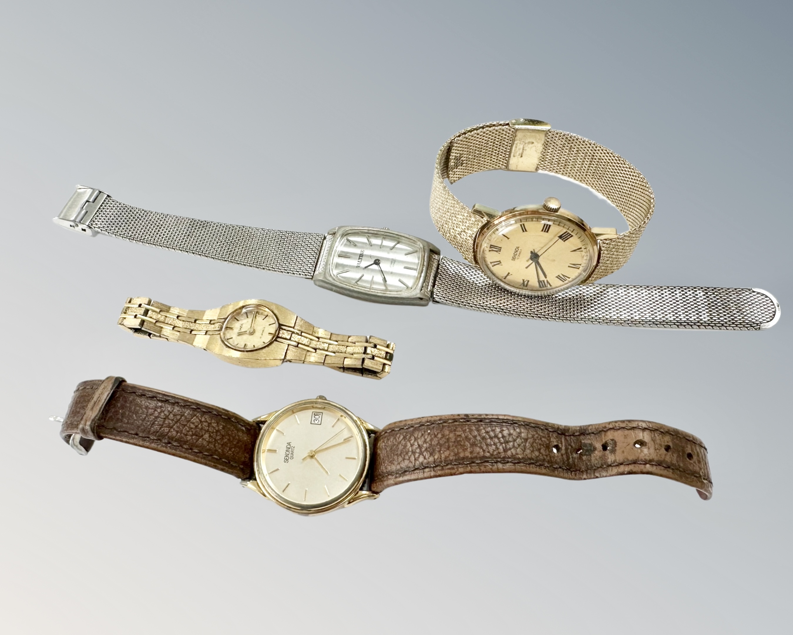Four various gent's and lady's watches including three Sekonda and one Valtine.