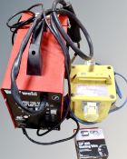 A Wolfweld mig welder together with welding wire and 110v transformer.