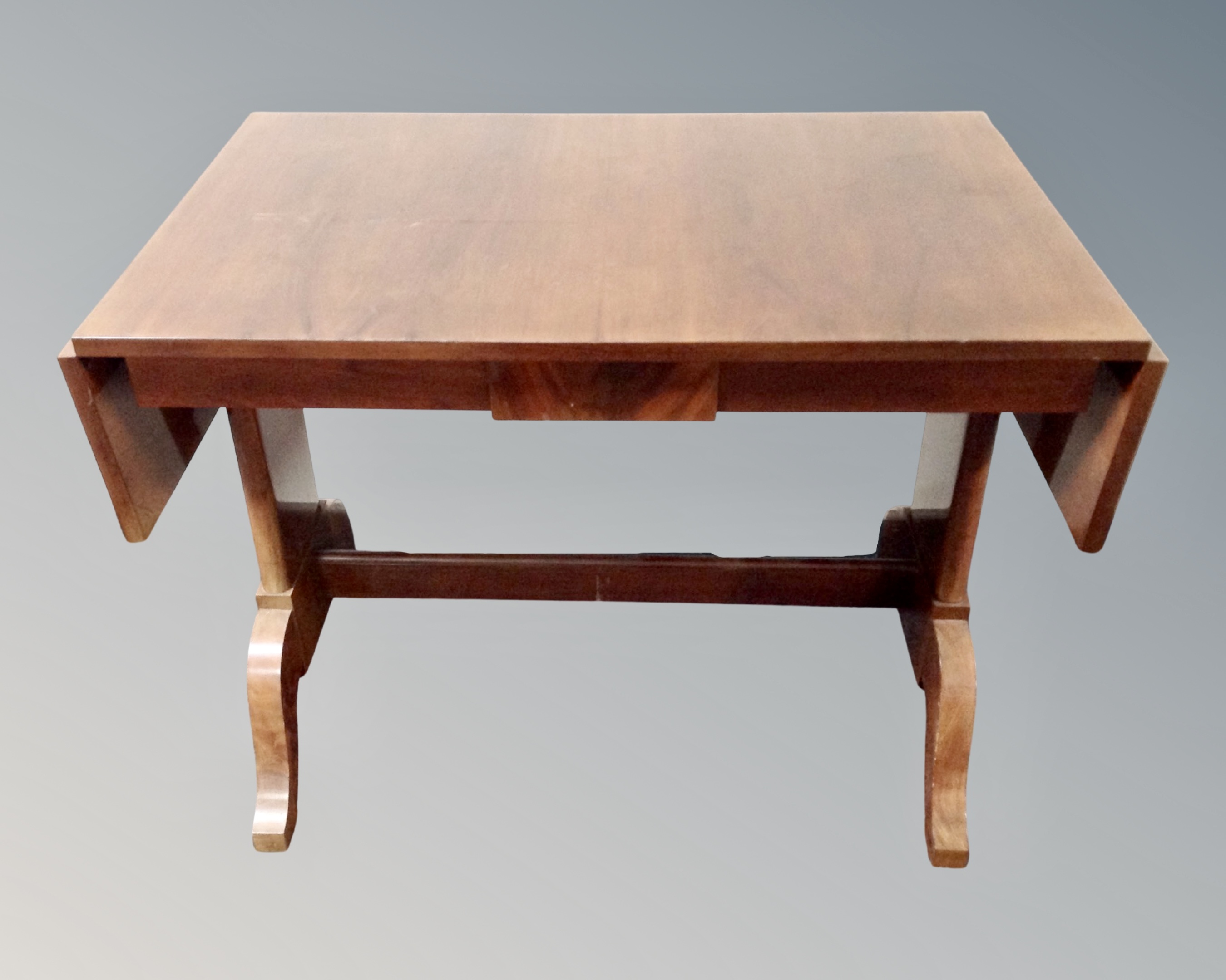 A 19th century mahogany drop leaf sofa table.