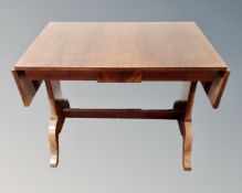 A 19th century mahogany drop leaf sofa table.