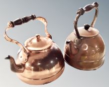 Two vintage copper kettles.