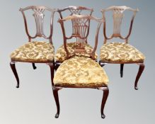 A set of four 19th century mahogany dining chairs on cabriole legs