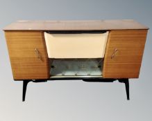 A mid 20th century cocktail sideboard