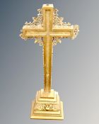 A gilt wood altar crucifix.