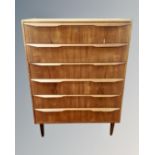 A 20th century Scandinavian teak six drawer chest.