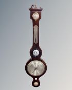 A 19th century rosewood banjo barometer.