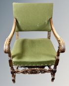 A continental carved beech armchair.