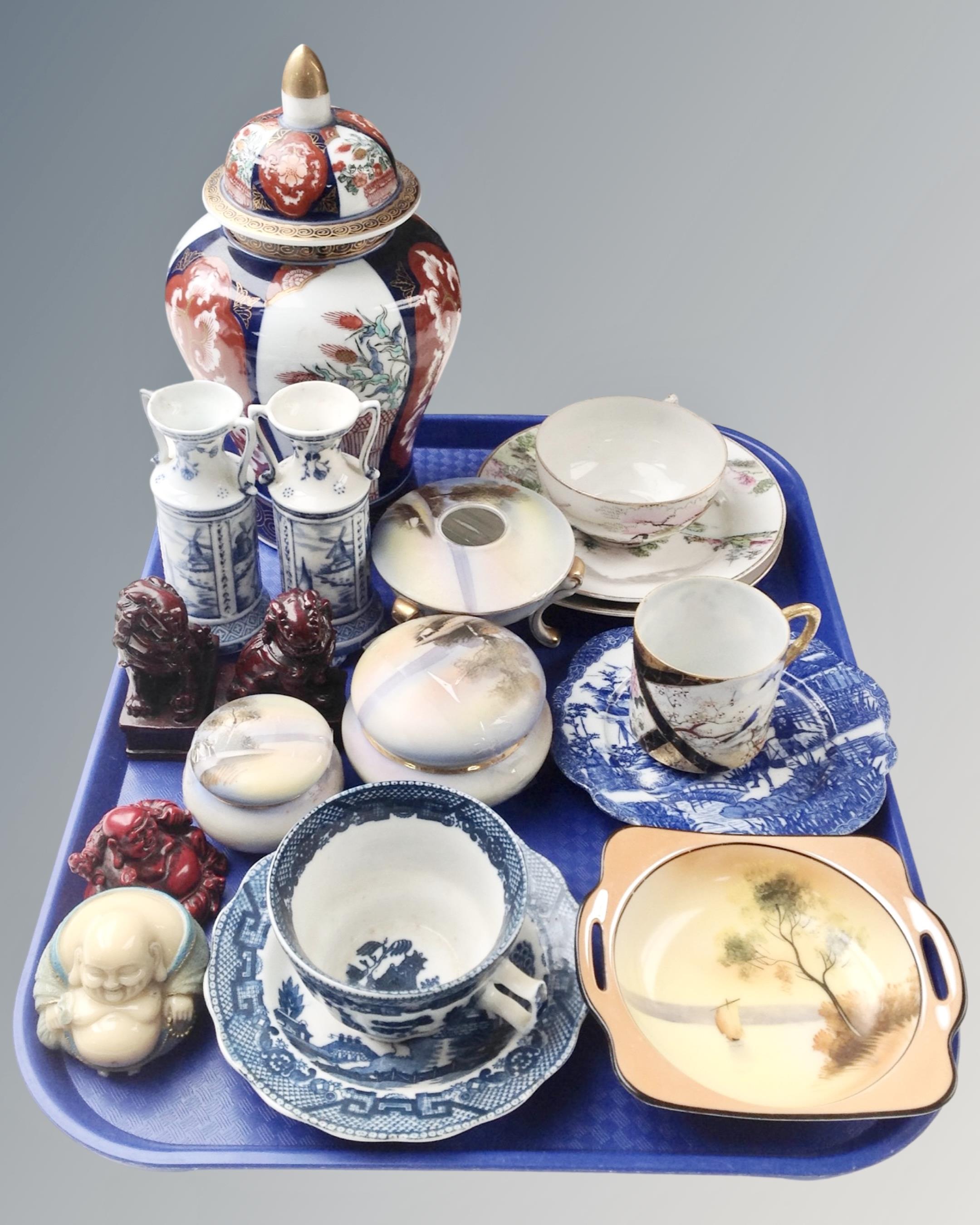 A tray containing assorted Oriental Ceramics and figures.